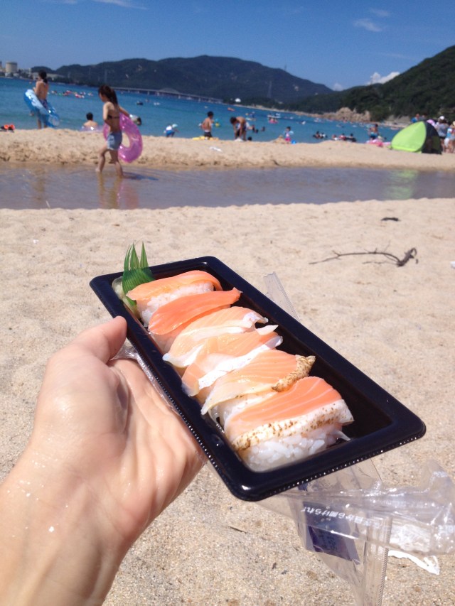 Sushi at the beach! Bought it at the daiso (convenience store) for 400 yen (less than 4 dollars).